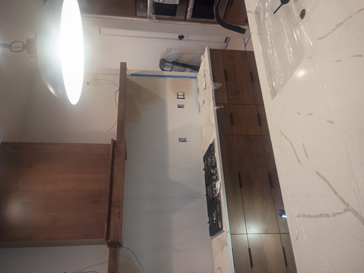 Finished ceiling and wall after drywall repair